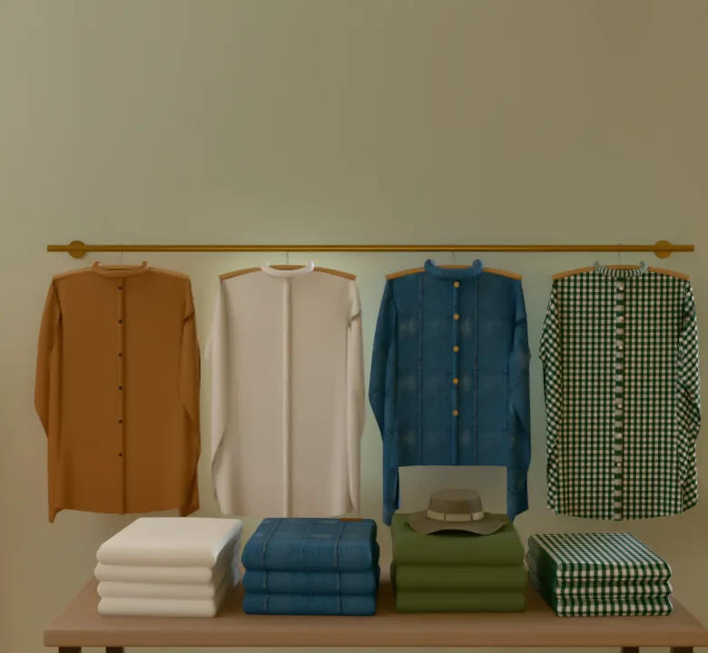 Slater, a clothing shop in Brooklyn, by day: shirts on a brass rail against a sage wall, and folded stacks on an oak table